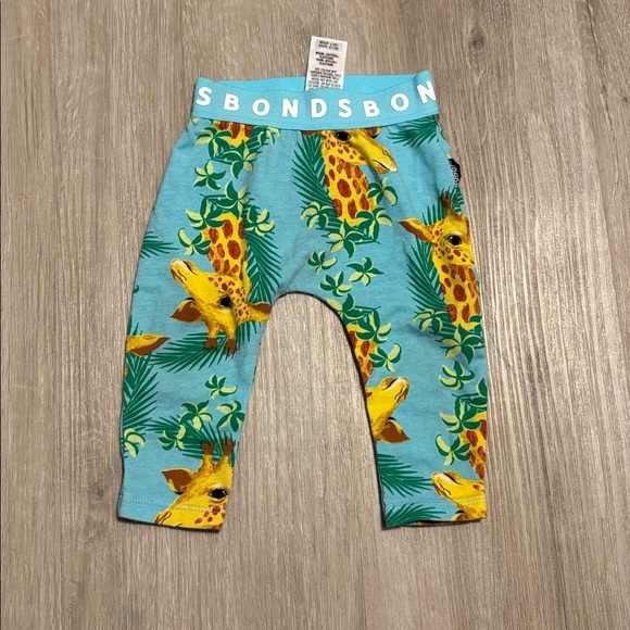 Bonds Baby Pants with Blue and Yellow Giraffe Design - Picture 1 of 1